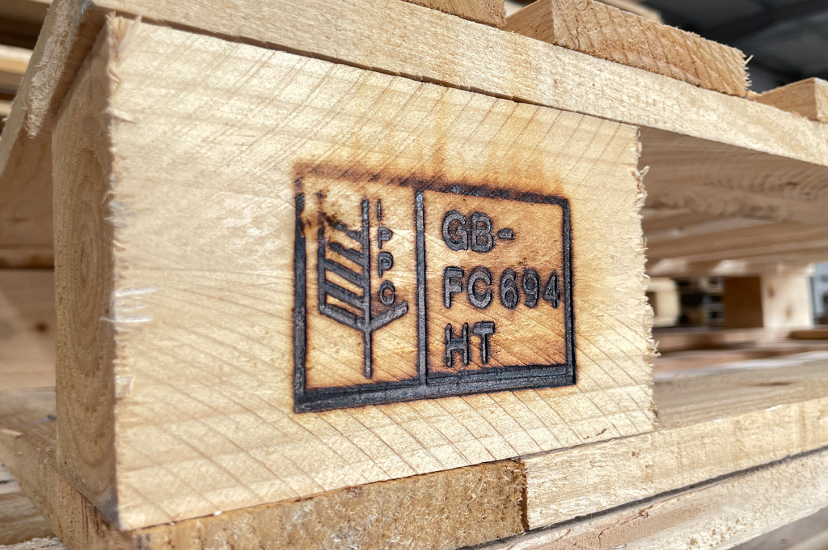 A wooden pallet that has the heat treated stamp on it